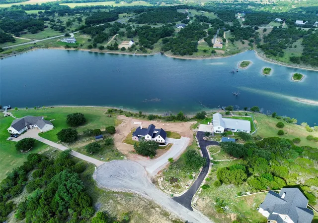 Photo 3 of Single family home for sale at 980 Anglers Pt, Bluff Dale, TX 76433 | MLS# 21296567 | Listing updated on 2026-09-28