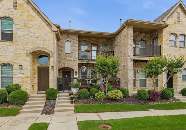 Photo 1 of Townhouse for sale at 1408 Arapaho Dr, Carrollton, TX 75010 | MLS# 21305931 | Listing updated on 2026-08-26