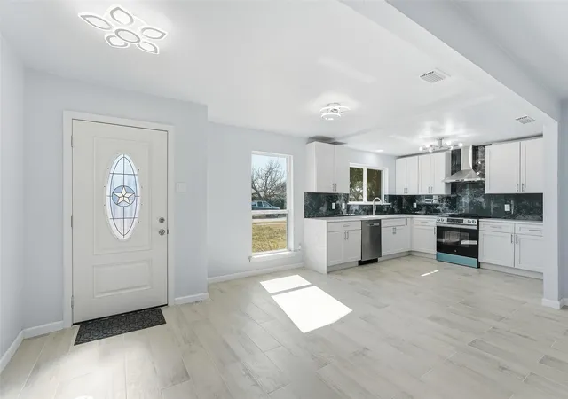 Photo 3 of Single family home for sale at 1813 Crockett St, Garland, TX 75042 | MLS# 21306889 | Listing updated on 2026-07-25