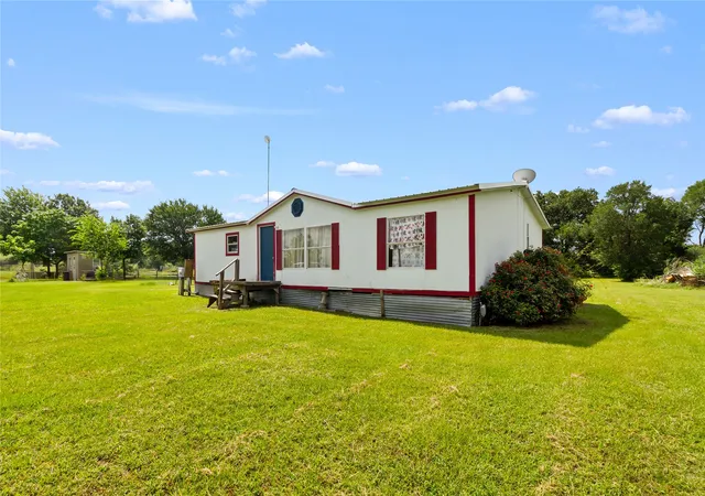 Photo 2 of Manufactured home for sale at 1501 2nd St, Kerens, TX 75144 | MLS# 21308364 | Listing updated on 2026-08-24