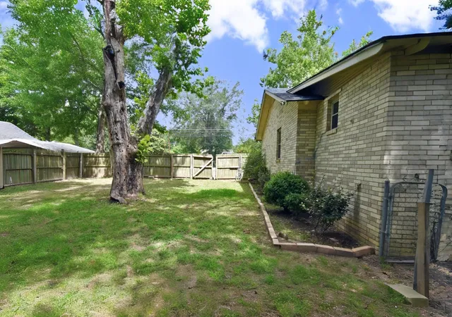 Photo 3 of Single family home for sale at 411 N Winnsboro St, Quitman, TX 75783 | MLS# 21306487 | Listing updated on 2026-08-22