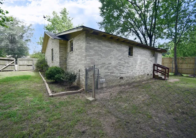 Photo 4 of Single family home for sale at 411 N Winnsboro St, Quitman, TX 75783 | MLS# 21306487 | Listing updated on 2026-08-22