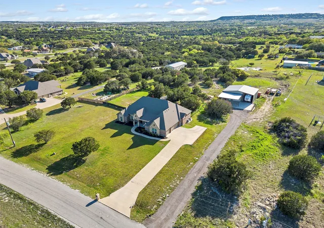 4th image of 701 Milton Ct, Granbury, TX 76048 | MLS# 21309623