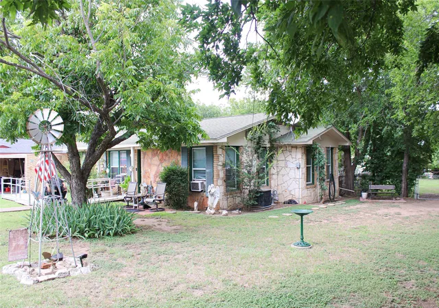 Photo 2 of Single family home for sale at 110 N Cherry Ln, Granbury, TX 76048 | MLS# 21310652 | Listing updated on 2026-08-17