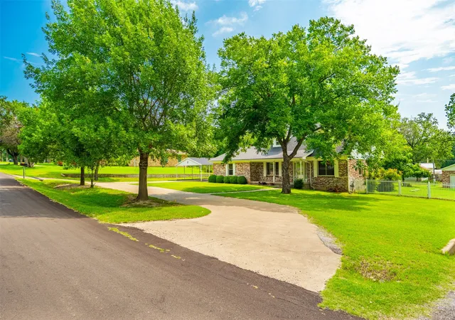 Photo 3 of Single family home for sale at 210 Yucca Dr, Weatherford, TX 76087 | MLS# 21308913 | Listing updated on 2026-08-22