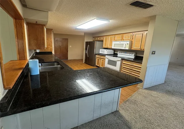 Photo 3 of Single family home for sale at 3904 Cimmaron Trl, Granbury, TX 76049 | MLS# 21312509 | Listing updated on 2026-07-26