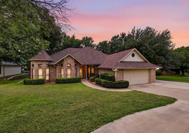 Photo 1 of Single family home for sale at 4111 Cimmaron Trl, Granbury, TX 76049 | MLS# 21311292 | Listing updated on 2026-07-26