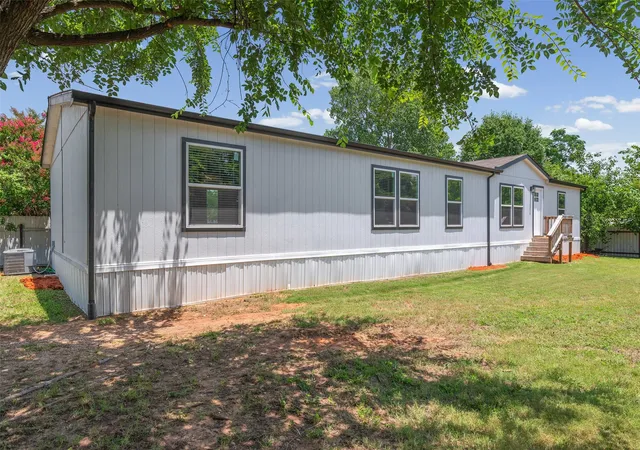 Photo 3 of Manufactured home for sale at 4009 Diann Dr, Granbury, TX 76049 | MLS# 21312237 | Listing updated on 2026-09-04