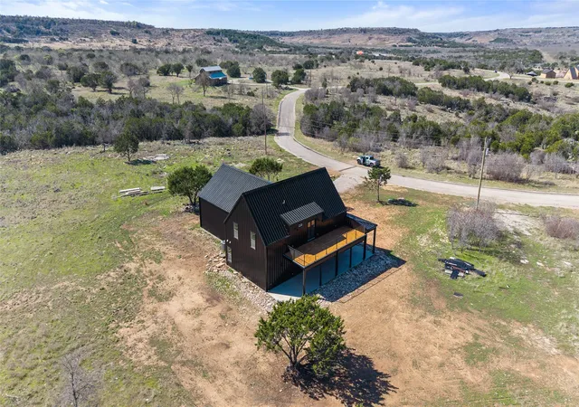 Photo 3 of Single family home for sale at 1053 Bluff Creek Dr, Strawn, TX 76475 | MLS# 21313347 | Listing updated on 2026-09-25