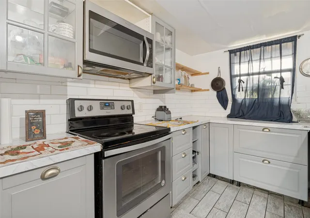 Photo 3 of Townhouse for sale at 1402 S Carrier Pkwy #202, Grand Prairie, TX 75051 | MLS# 21308006 | Listing updated on 2026-08-25