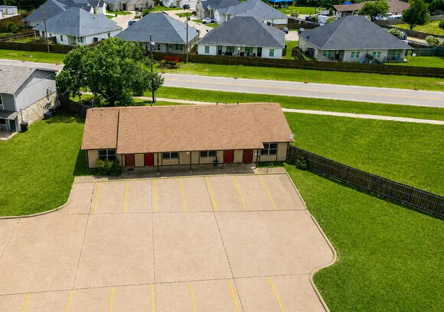 Photo 2 of Multi family home for sale at 1411 Courtney Pl, Cleburne, TX 76033 | MLS# 21309199 | Listing updated on 2026-08-06