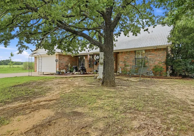 Photo 1 of Single family home for sale at 7277 W Line Rd, Collinsville, TX 76233 | MLS# 21310341 | Listing updated on 2026-08-22