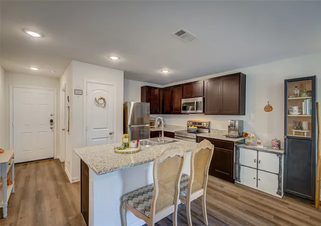 Photo 2 of Single family home for sale at 1411 Hemphill St, Greenville, TX 75401 | MLS# 21318001 | Listing updated on 2026-08-28