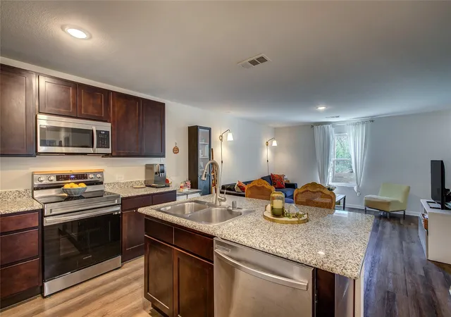 Photo 4 of Single family home for sale at 1411 Hemphill St, Greenville, TX 75401 | MLS# 21318001 | Listing updated on 2026-08-28