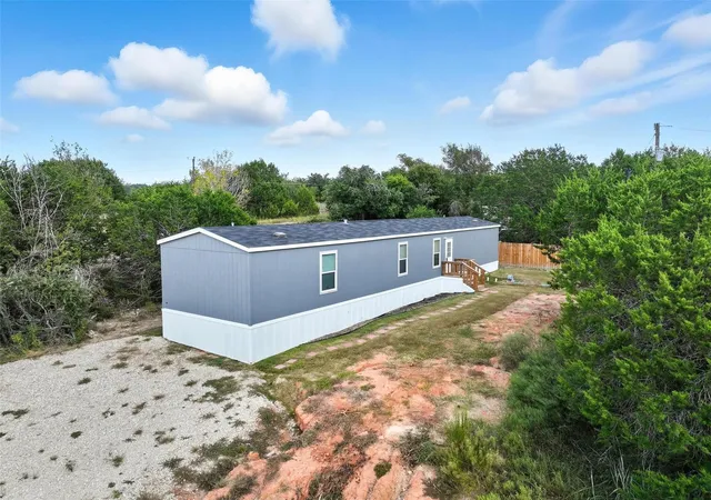 Photo 1 of Manufactured home for sale at 6303 N Oklahoma Trl, Granbury, TX 76048 | MLS# 21318801 | Listing updated on 2026-08-29