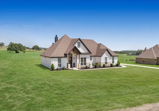 Photo 3 of Single family home for sale at 1005 Paradise Pkwy, Poolville, TX 76487 | MLS# 21318254 | Listing updated on 2026-07-11