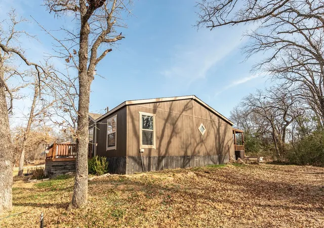 Photo 2 of Manufactured home for sale at 18 Pawnee Trl, Nocona, TX 76255 | MLS# 21324599 | Listing updated on 2026-07-08