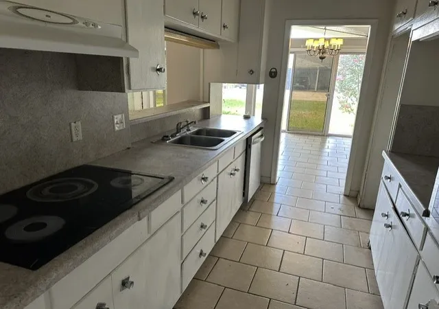 Photo 3 of Single family home for sale at 1705 Jefferson St, Commerce, TX 75428 | MLS# 21324600 | Listing updated on 2026-08-26