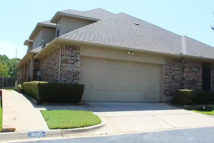 Photo 1 of Townhouse for sale at 1230 Woodland Park Dr, Hurst, TX 76053 | MLS# 21325202 | Listing updated on 2026-10-08