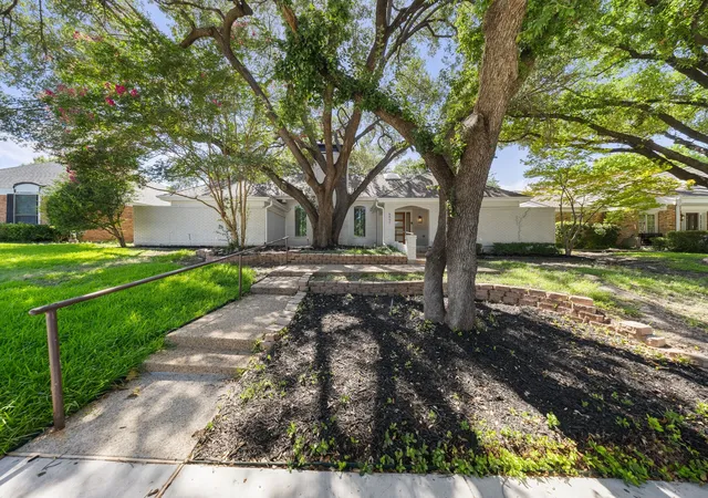 Photo 1 of Single family home for sale at 8557 Flint Falls Dr, Dallas, TX 75243 | MLS# 21318315 | Listing updated on 2026-08-23