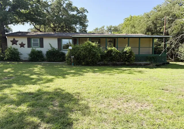 Photo 1 of Sale Pending at 310 Taurus Rd, Granbury, TX 76049 | MLS# 21322848 | Listing updated on 2026-08-19
