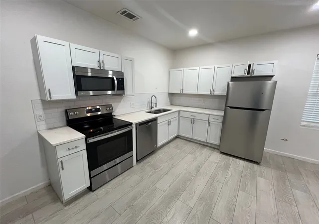Photo 3 of Multi family home for sale at 410 S Vaden St, Sherman, TX 75090 | MLS# 21327409 | Listing updated on 2026-07-10