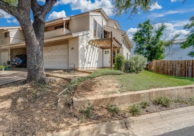 Photo 2 of Townhouse for sale at 29 Oakbrook Dr, Lewisville, TX 75057 | MLS# 21328182 | Listing updated on 2026-08-27