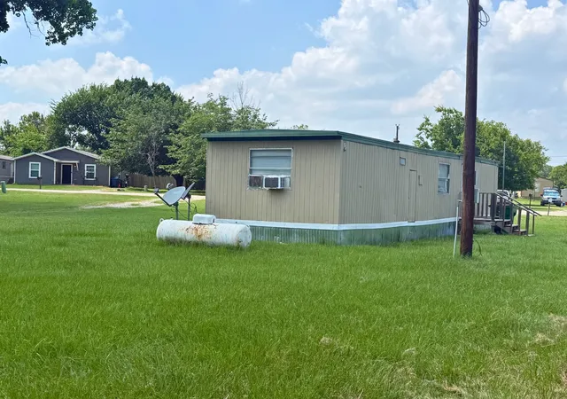 Photo 2 of Manufactured home for sale at 1524 Partridge Ct, Azle, TX 76020 | MLS# 21324286 | Listing updated on 2026-07-11