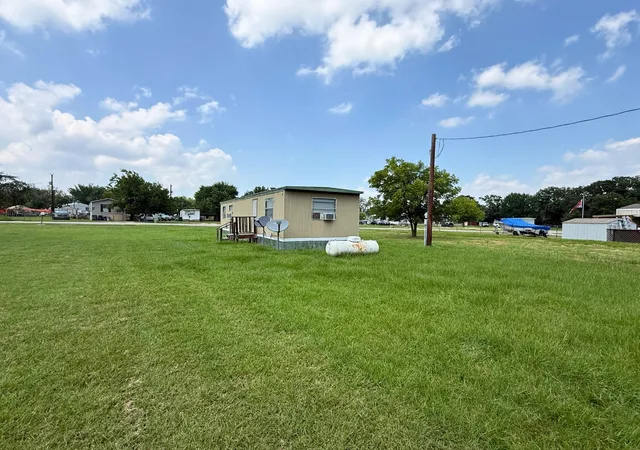 Photo 4 of Manufactured home for sale at 1524 Partridge Ct, Azle, TX 76020 | MLS# 21324286 | Listing updated on 2026-09-22