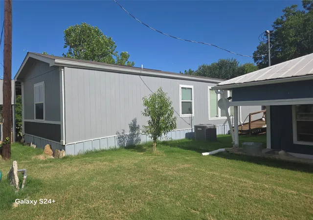 Photo 3 of Manufactured home for sale at 121 Peach, Graford, TX 76449 | MLS# 21328750 | Listing updated on 2026-08-22