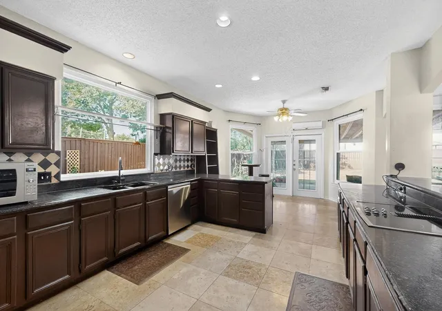 Photo 4 of Single family home for sale at 2221 Everglade Ct, Carrollton, TX 75006 | MLS# 21328763 | Listing updated on 2026-08-22