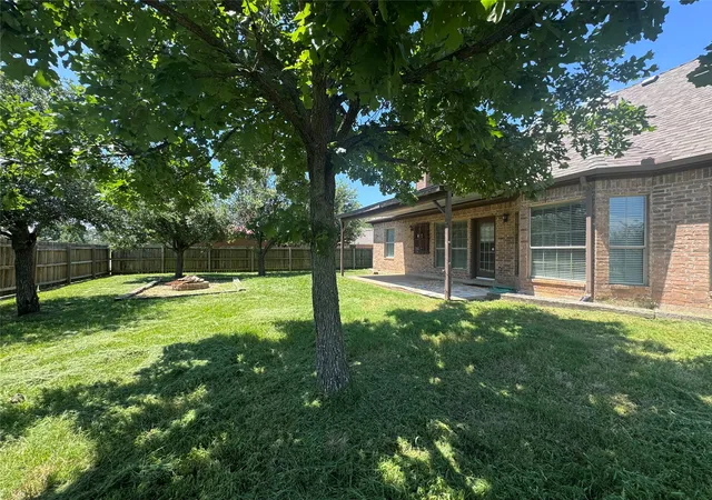 Photo 3 of Single family home for sale at 1403 Hickory Dr, Pilot Point, TX 76258 | MLS# 21325588 | Listing updated on 2026-09-24