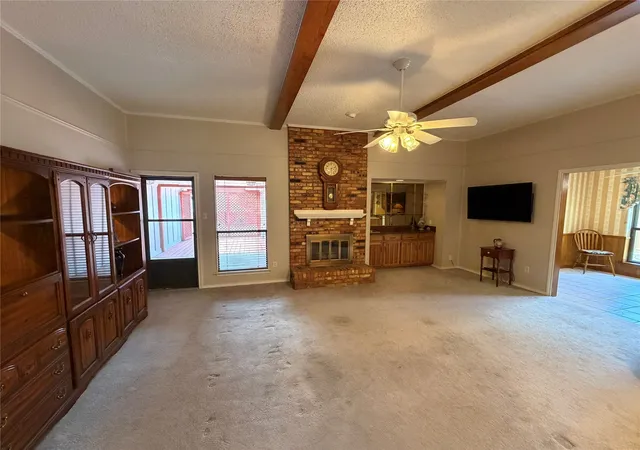 Photo 3 of Single family home for sale at 910 Village Green Dr, Rockwall, TX 75087 | MLS# 21330057 | Listing updated on 2026-07-23