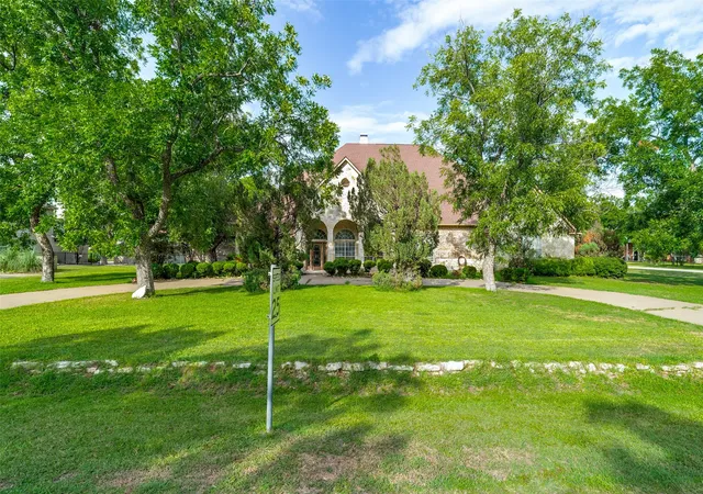 Photo 3 of Single family home for sale at 9709 Divot Dr, Granbury, TX 76049 | MLS# 21331578 | Listing updated on 2026-09-16