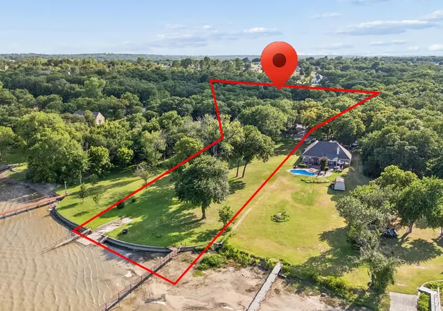 Single family home for sale at 9 N Eagle Pt #A, Azle, TX 76020 | MLS# 21330698 | Listing updated on 2026-10-07