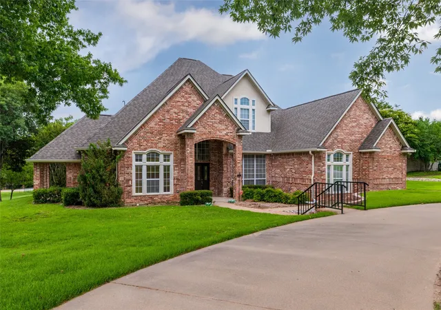 Photo 2 of Single family home for sale at 1917 Woodland Hills Ln, Weatherford, TX 76087 | MLS# 21314659 | Listing updated on 2026-10-06