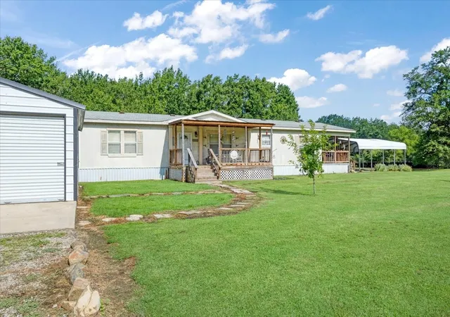 Photo 3 of Manufactured home for sale at 1022 County Road 2295, Telephone, TX 75488 | MLS# 21334749 | Listing updated on 2026-07-22