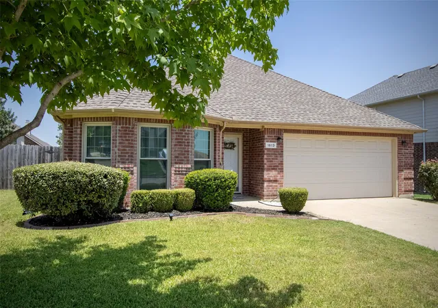 Photo 1 of Single family home for sale at 1613 Cowtown Dr, Mansfield, TX 76063 | MLS# 21334830 | Listing updated on 2026-10-03