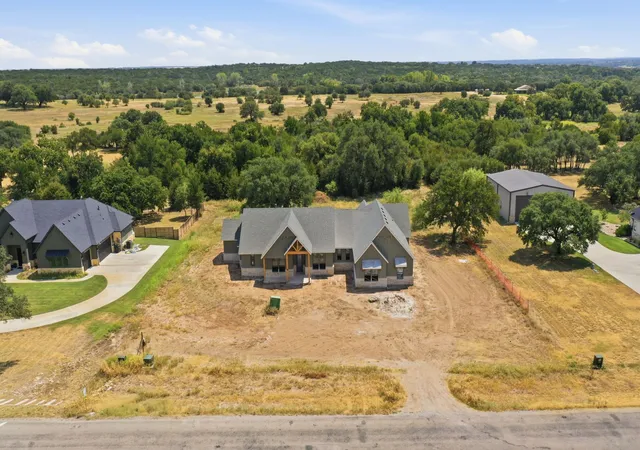 Photo 4 of Single family home for sale at 1048 Timber Hills Dr, Weatherford, TX 76087 | MLS# 21317713 | Listing updated on 2026-08-26