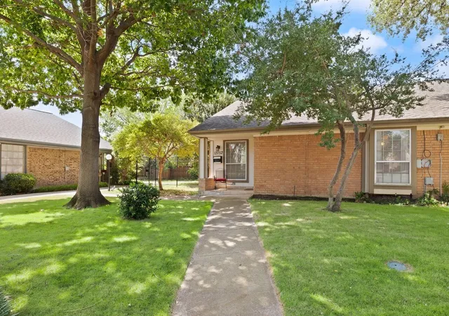 Photo 1 of Townhouse for sale at 13752 Flagstone Ln, Dallas, TX 75240 | MLS# 21335166 | Listing updated on 2026-08-08