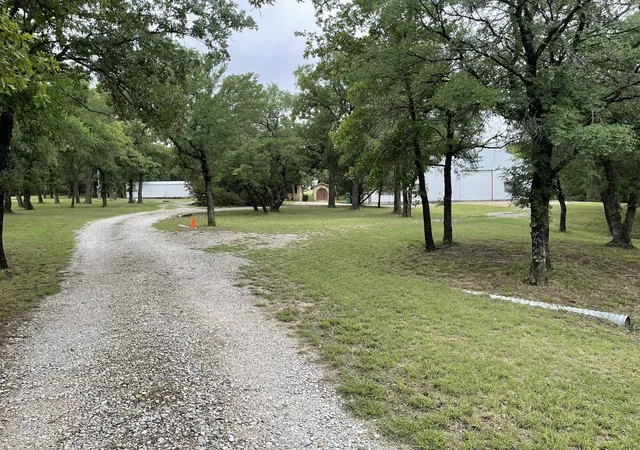 Photo 2 of Single family home for sale at 296 E Bluff Springs Rd, Fort Worth, TX 76108 | MLS# 21339077 | Listing updated on 2026-07-25
