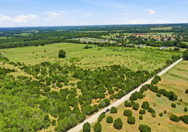 Photo 2 of Land for sale at Tbd E Fm 2210 E, Poolville, TX 76487 | MLS# 21338500 | Listing updated on 2026-07-27
