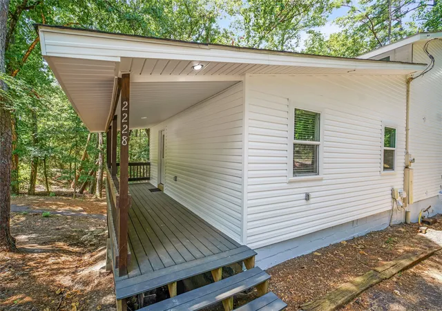 Photo 2 of Single family home for sale at 2228 W Holly Trail, Holly Lake Ranch, TX 75765 | MLS# 21339947 | Listing updated on 2026-09-04