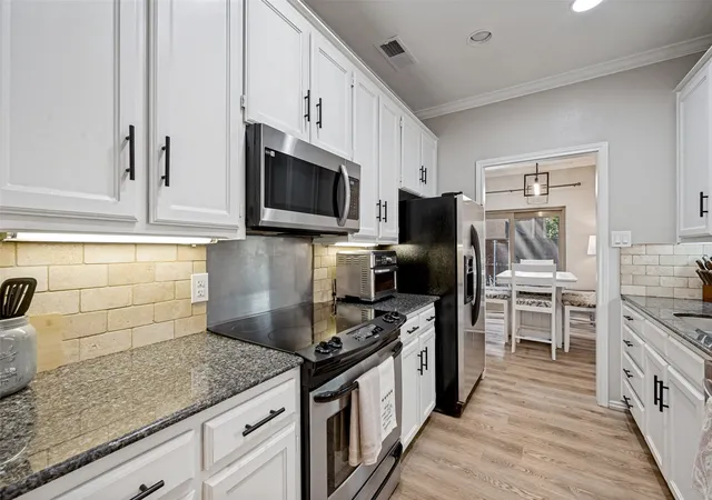 Photo 4 of Townhouse for sale at 5727 Remington Park Sq, Dallas, TX 75252 | MLS# 21343762 | Listing updated on 2026-08-08