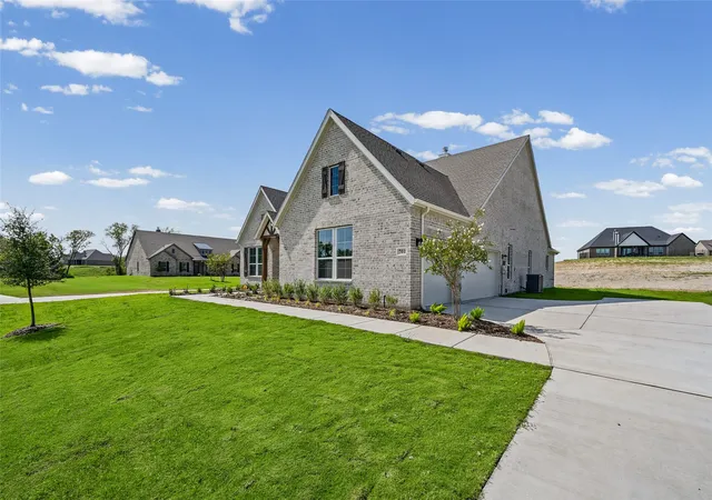 Photo 2 of Single family home for sale at 701 Water Side Dr, Van Alstyne, TX 75495 | MLS# 21345526 | Listing updated on 2026-10-07