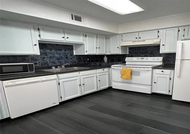 Photo 3 of Condo for sale at 9811 Walnut St #104, Dallas, TX 75243 | MLS# 21344250 | Listing updated on 2026-08-05