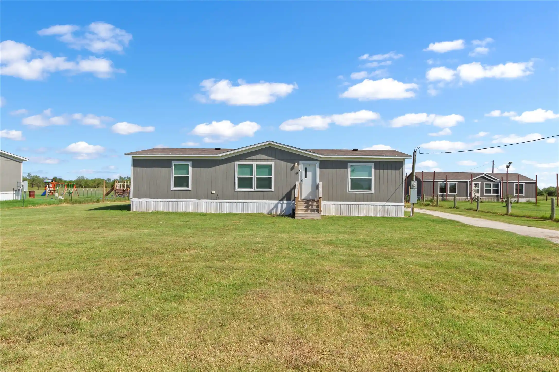 Photo 1 of Manufactured home for sale at 2347 Ne County Road 2070, Powell, TX 75153 | MLS# 21347474 | Listing updated on 2026-10-24