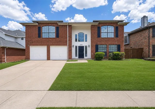 Photo 1 of Single family home for sale at 1104 Breezewood Dr, Lewisville, TX 75077 | MLS# 21335523 | Listing updated on 2026-08-12