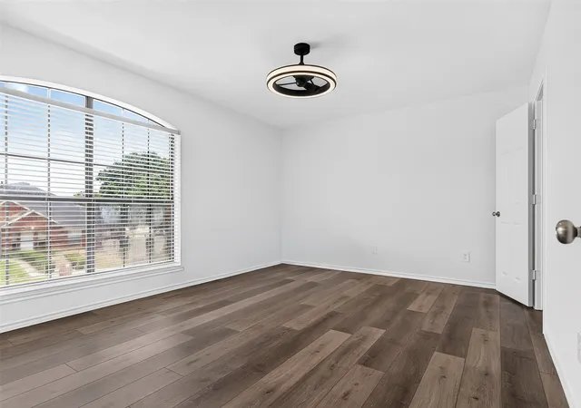 Photo 4 of Single family home for sale at 1104 Breezewood Dr, Lewisville, TX 75077 | MLS# 21335523 | Listing updated on 2026-08-12