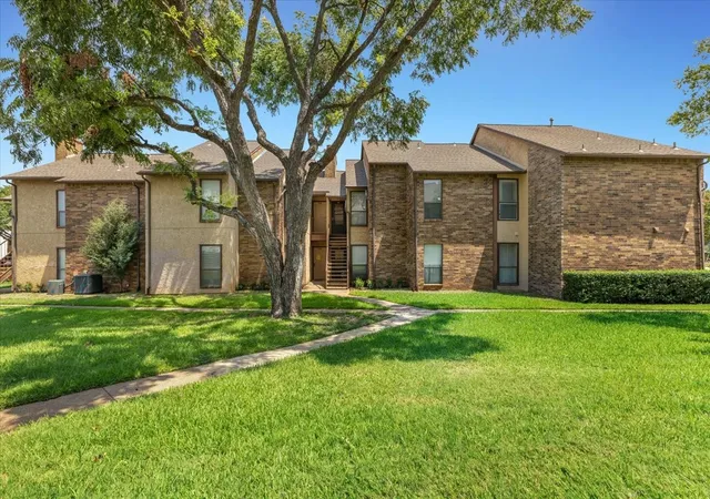 Photo 1 of Condo for sale at 1908 Cloisters Dr #511, Arlington, TX 76011 | MLS# 21347452 | Listing updated on 2026-09-26